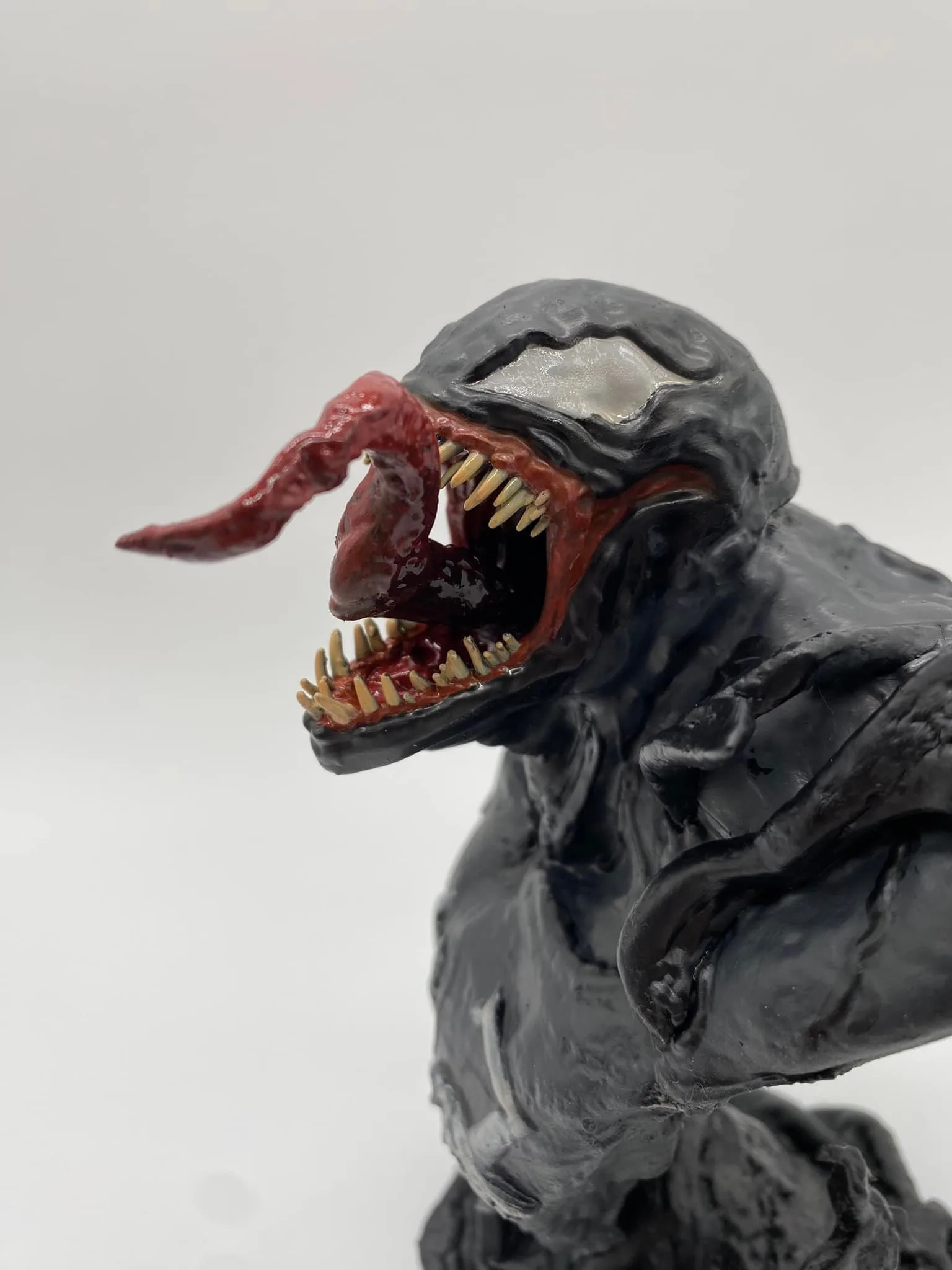 Close-up of Venom's menacing expression and detail painting