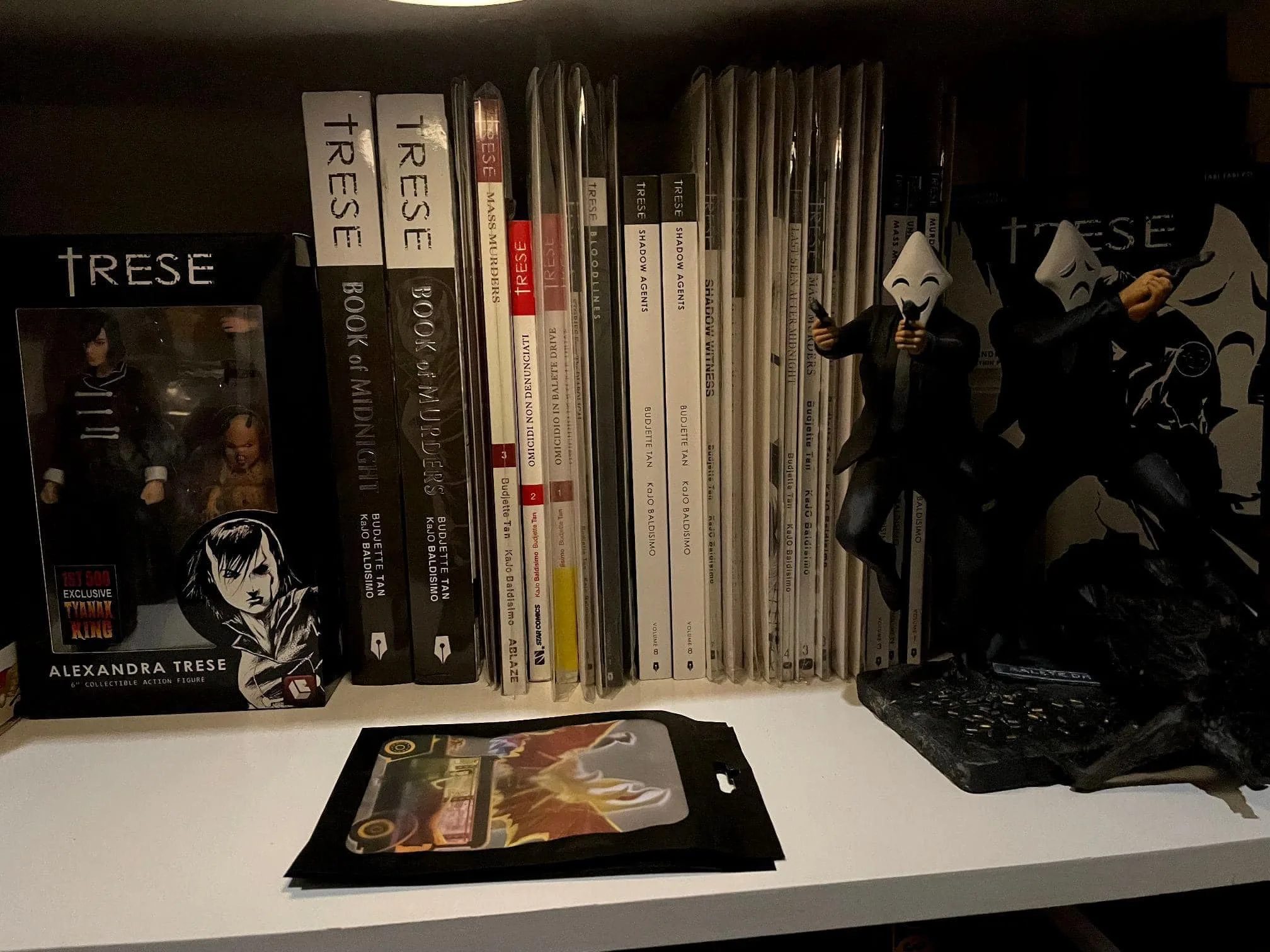 Crispin and Basilio Trese Kambal sculpture featured inside an official Trese collector's display case
