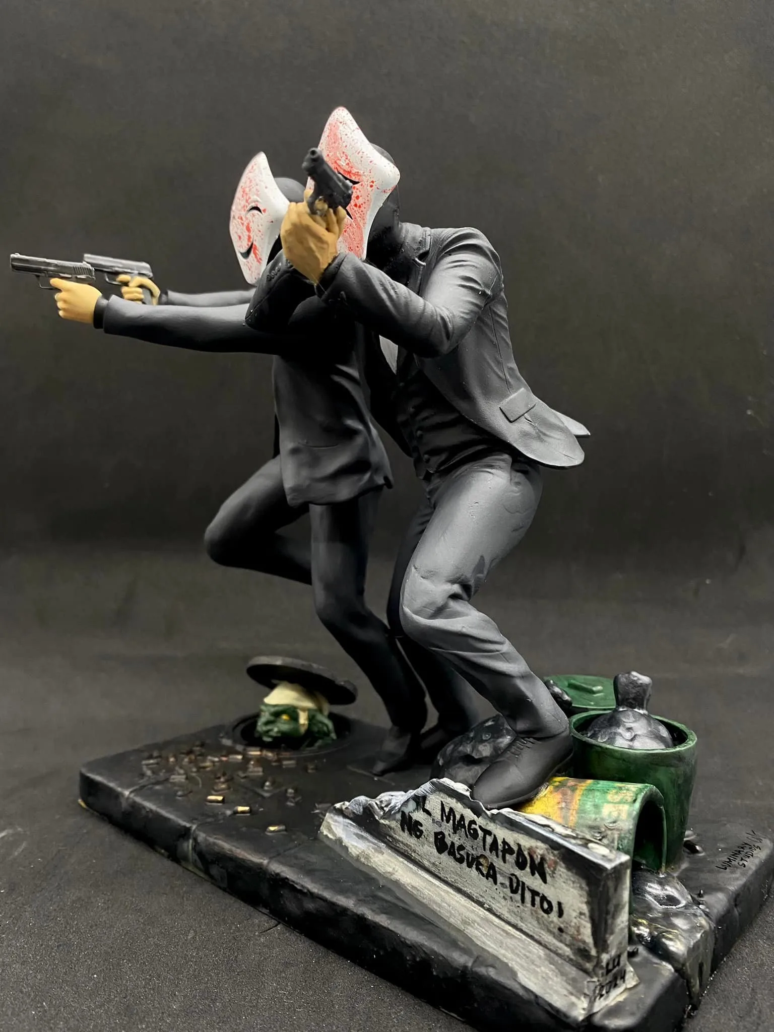 Close-up of the Crispin and Basilio v3 sculpture's Boyset Paints easter egg, a play on the Boysen paint brand