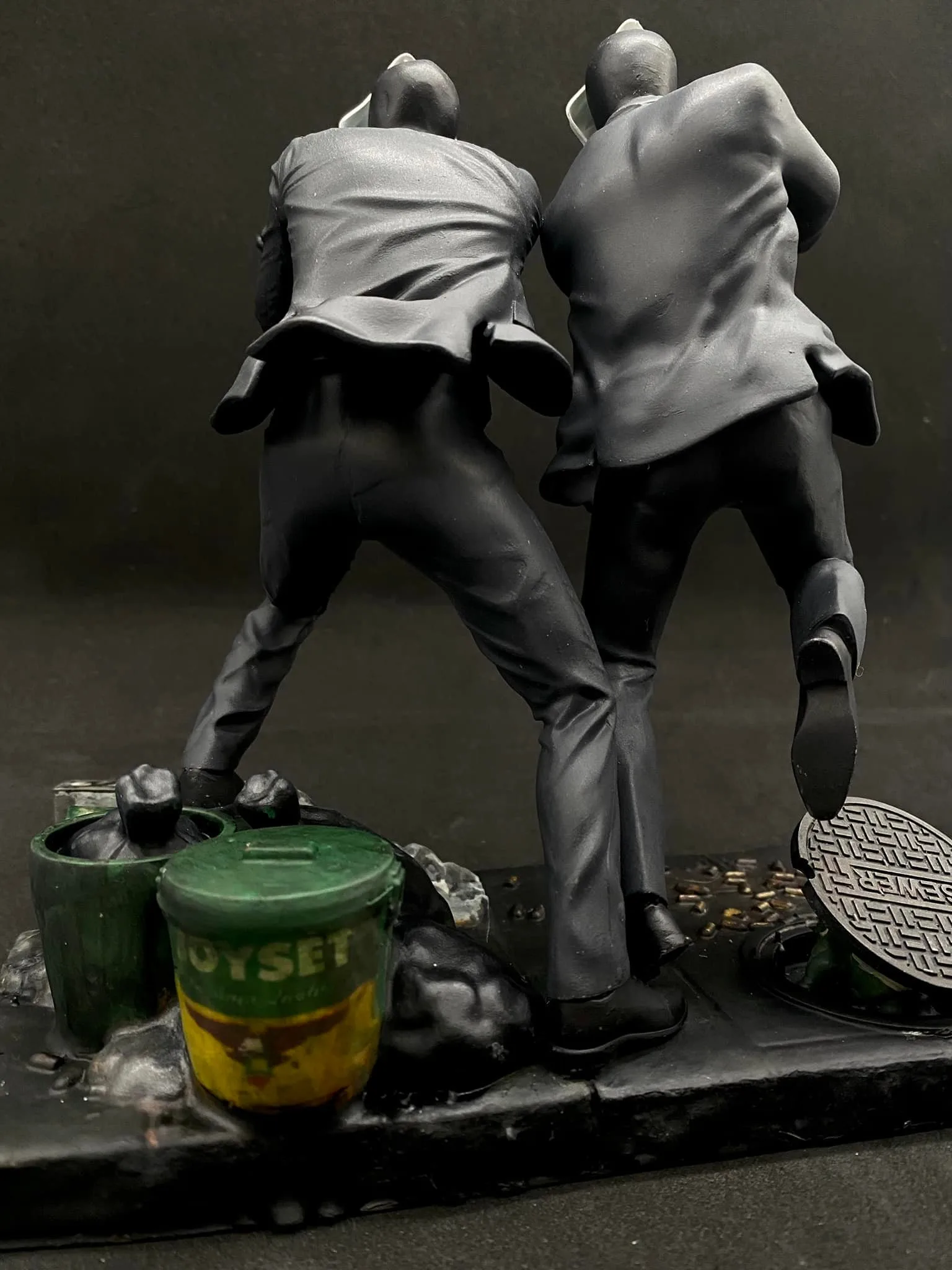 Alternate angle of the Crispin and Basilio v3 Trese Kambal sculpture base signage