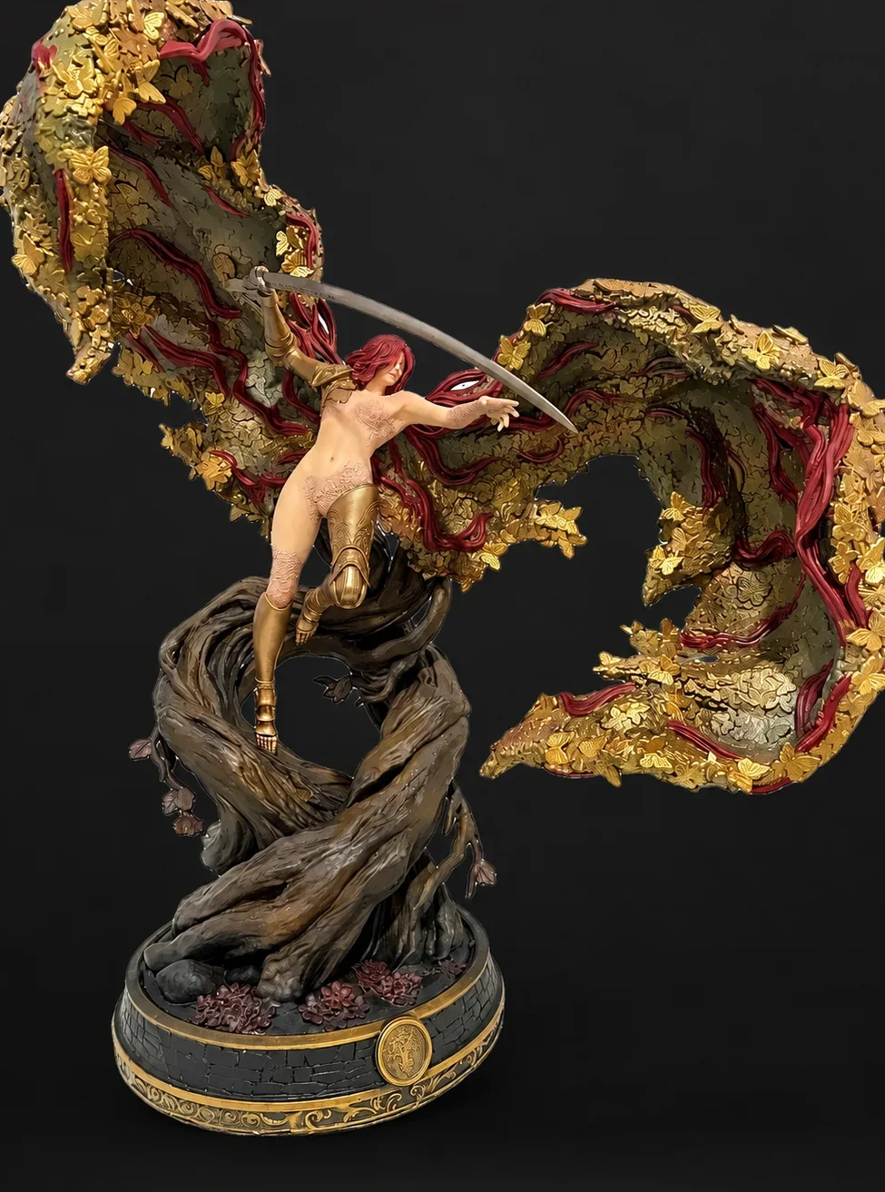 Malenia statue with her sword raised across the scarlet rot