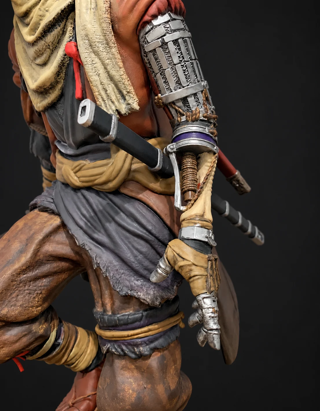 Close-up of the painted Shinobi Prosthetic arm on the Sekiro statue